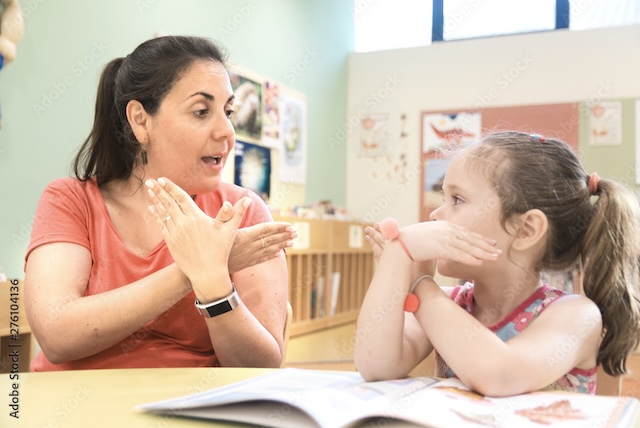 Classroom setting with teacher and student